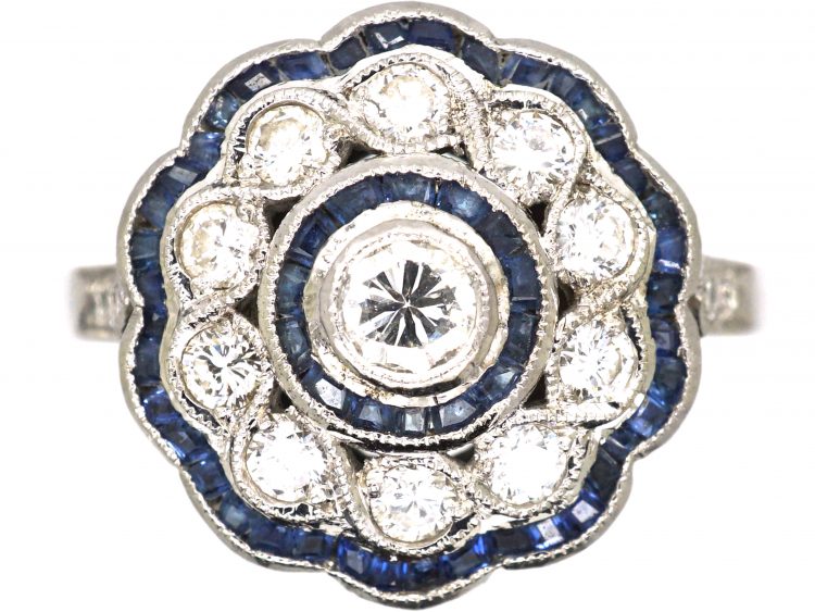 Early 20th Century French Platinum Cluster Target Ring set with Diamonds & Calibre Cut Sapphires