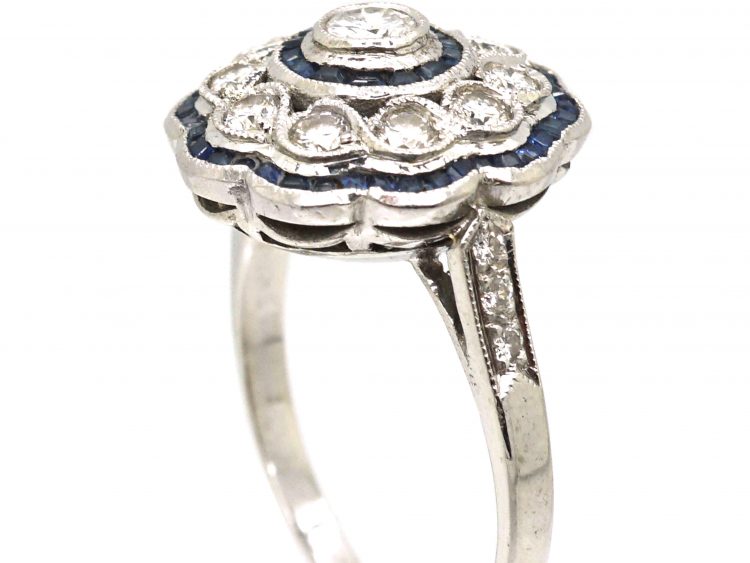 Early 20th Century French Platinum Cluster Target Ring set with Diamonds & Calibre Cut Sapphires