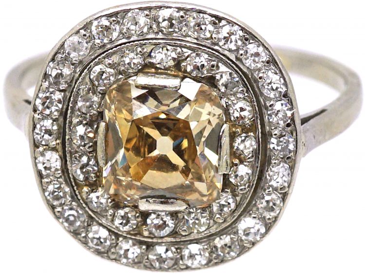 Early 20th Century Platinum, Diamond Cluster Ring with Cognac Diamond in the Centre