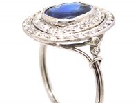 Early 20th Century Platinum, Octagonal Cut Sapphire & Diamond Cluster Ring