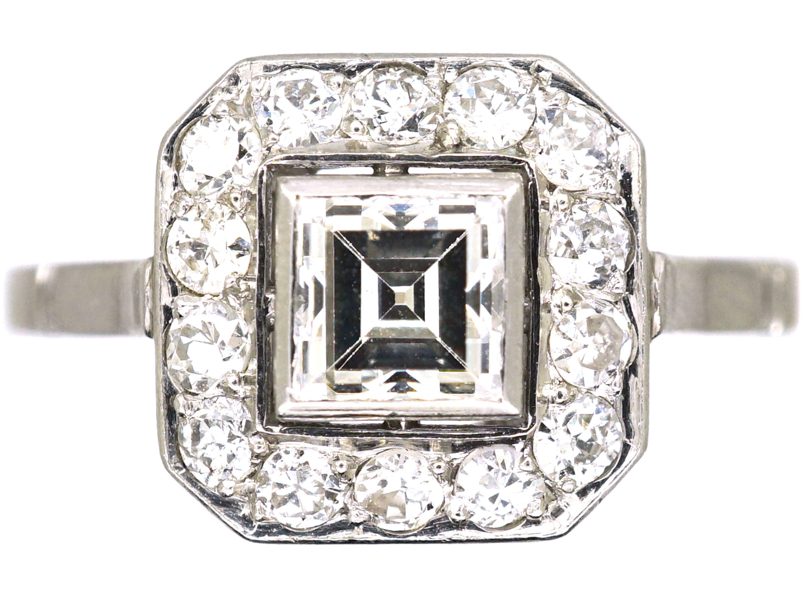 Art Deco French Platinum Octagonal Shaped Ring set with an Carré Cut Diamond with a Diamond Surround