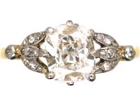 Edwardian 18ct Gold & Platinum, Diamond Solitaire Ring with Diamond Set Leaf Shoulders