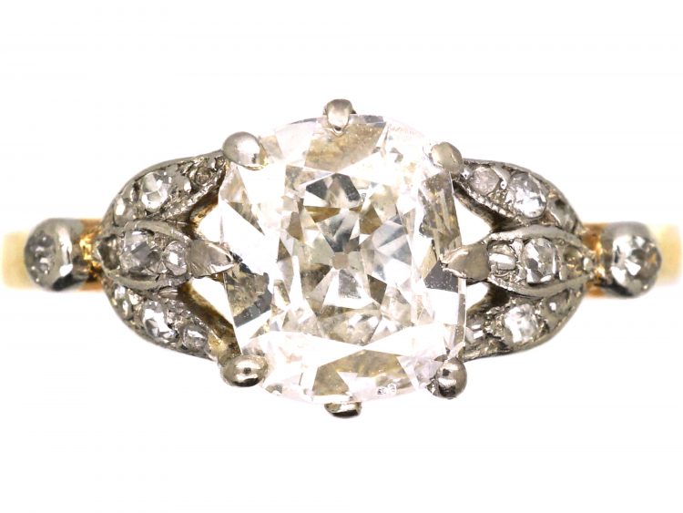 Edwardian 18ct Gold & Platinum, Diamond Solitaire Ring with Diamond Set Leaf Shoulders