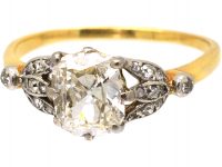 Edwardian 18ct Gold & Platinum, Diamond Solitaire Ring with Diamond Set Leaf Shoulders