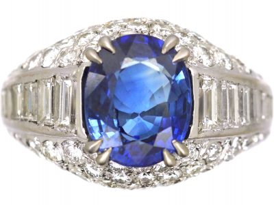 French Early 20th Century Platinum, Bombe Ring set with a Sapphire & Diamonds