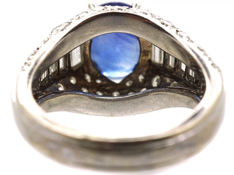 French Early 20th Century Platinum, Bombe Ring set with a Sapphire & Diamonds