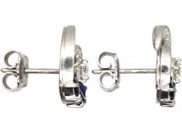 Early 20th Century Platinum Coil Design Earrings set with Sapphires & Diamonds