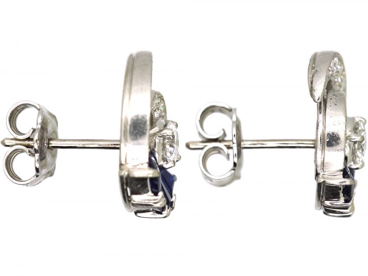 Early 20th Century Platinum Coil Design Earrings set with Sapphires & Diamonds