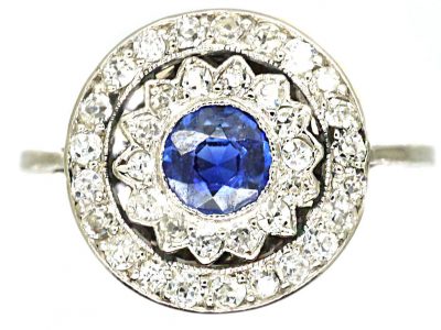 Edwardian Platinum, Sapphire & Diamond Daisy Cluster Ring within a Circle of Diamonds