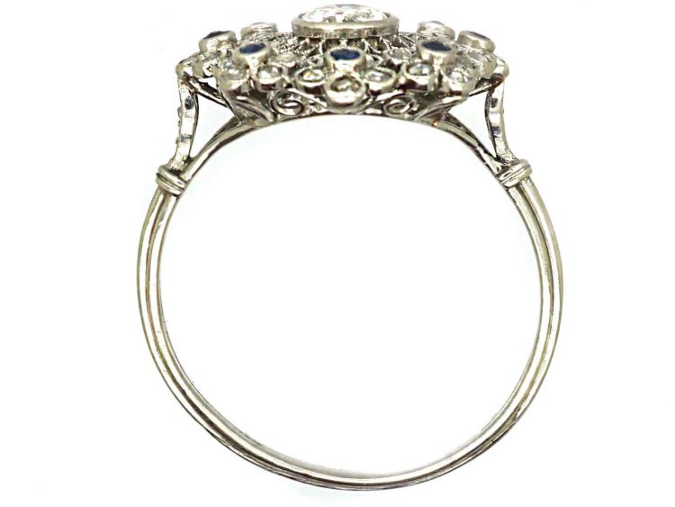 Early 20th Century Platinum, Flower Cluster Ring set with Sapphires & Diamonds