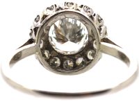 Mid 20th Century Platinum Diamond Cluster Ring set with 1.80 Carat Centre Diamond