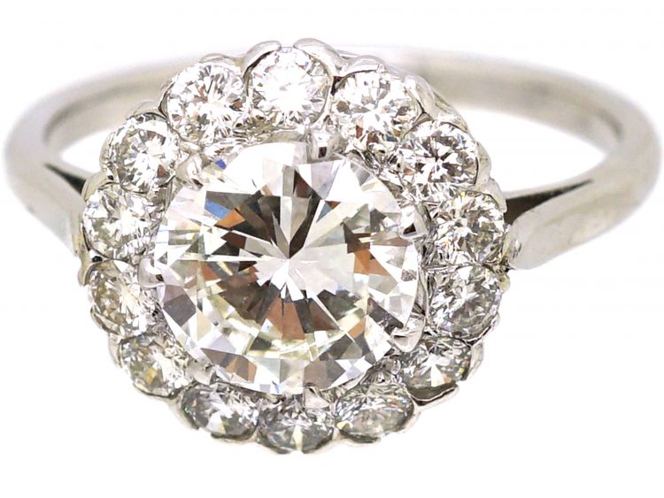 Mid 20th Century Platinum Diamond Cluster Ring set with 1.80 Carat Centre Diamond