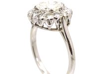 Mid 20th Century Platinum Diamond Cluster Ring set with 1.80 Carat Centre Diamond