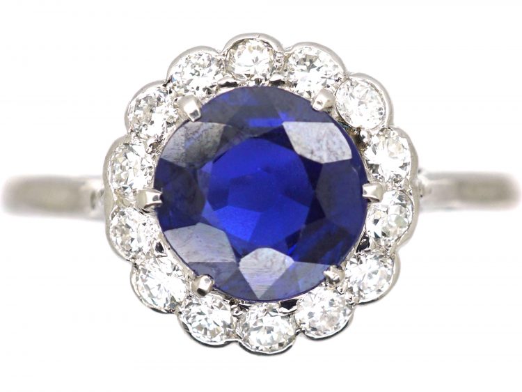 Mid 20th Century Platinum Cluster Ring set with a Burma Sapphire & Diamonds