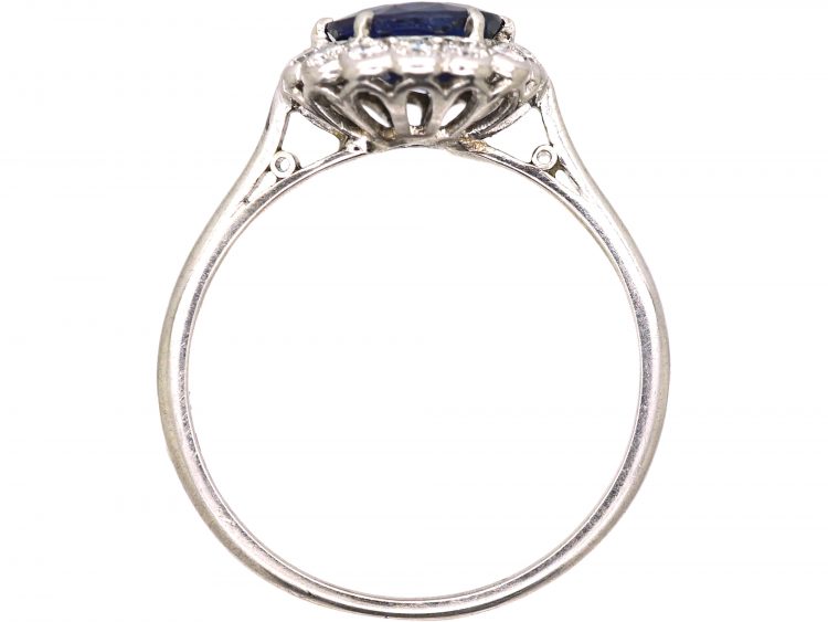 Mid 20th Century Platinum Cluster Ring set with a Burma Sapphire & Diamonds