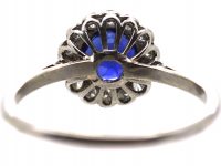 Mid 20th Century Platinum Cluster Ring set with a Burma Sapphire & Diamonds