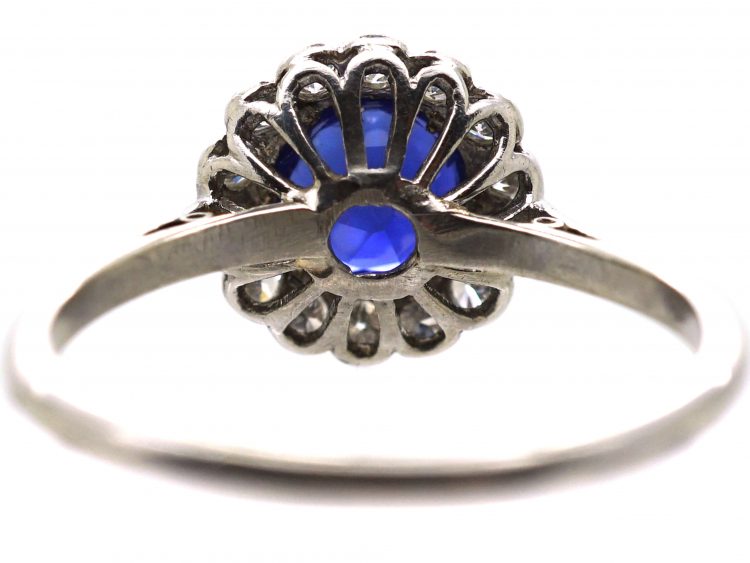 Mid 20th Century Platinum Cluster Ring set with a Burma Sapphire & Diamonds