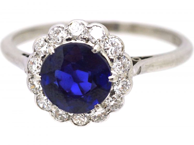 Mid 20th Century Platinum Cluster Ring set with a Burma Sapphire & Diamonds