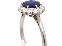 Mid 20th Century Platinum Cluster Ring set with a Burma Sapphire & Diamonds