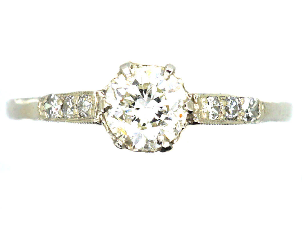 Early 20th Century Platinum Solitaire Diamond Ring with Diamond set Shoulders