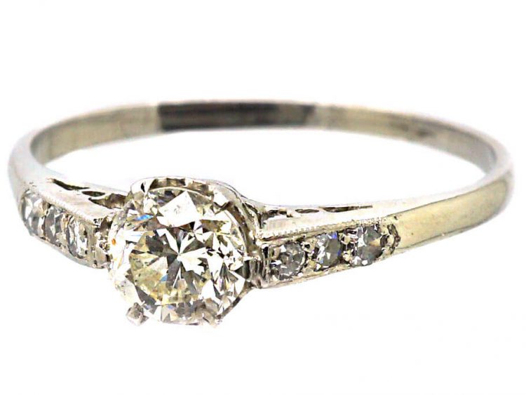 Early 20th Century Platinum Solitaire Diamond Ring with Diamond set Shoulders