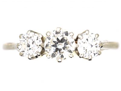 Early 20th Century Platinum Three Stone Early Brilliant Cut Diamond Ring