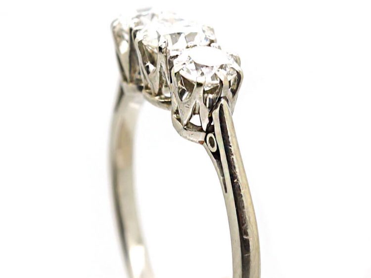 Early 20th Century Platinum Three Stone Early Brilliant Cut Diamond Ring