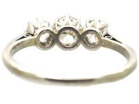 Early 20th Century Platinum Three Stone Early Brilliant Cut Diamond Ring