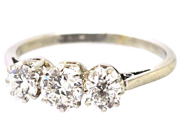 Early 20th Century Platinum Three Stone Early Brilliant Cut Diamond Ring