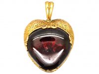 Early Victorian 15ct Gold Heart Shaped Pendant set with a Cabochon Garnet