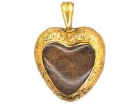 Early Victorian 15ct Gold Heart Shaped Pendant set with a Cabochon Garnet