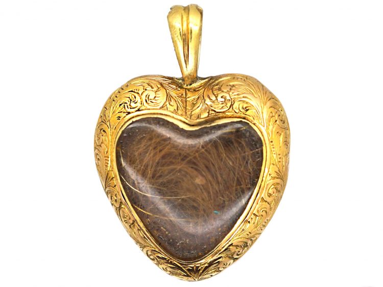 Early Victorian 15ct Gold Heart Shaped Pendant set with a Cabochon Garnet