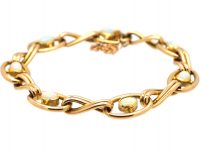 Edwardian 15ct Gold Bracelet set with Opals