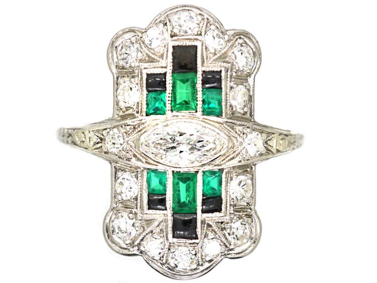 Early 20th Century Platinum Ring set with Emeralds, Onyx & Diamonds