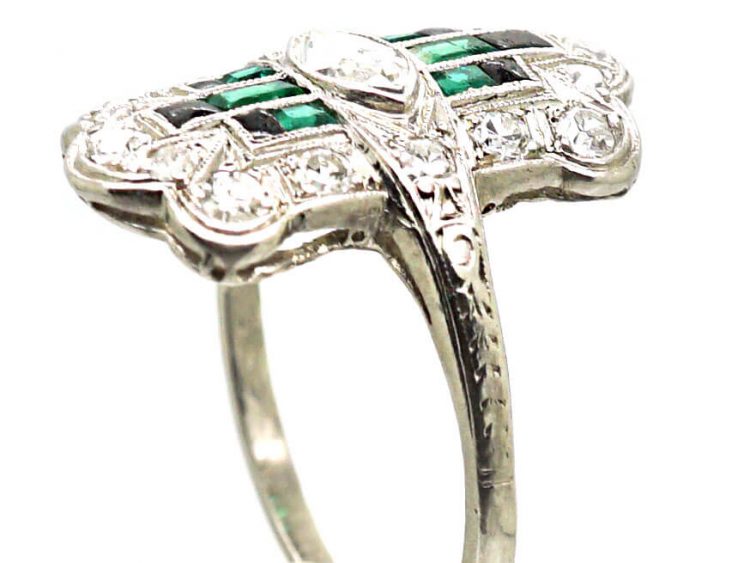 Early 20th Century Platinum Ring set with Emeralds, Onyx & Diamonds