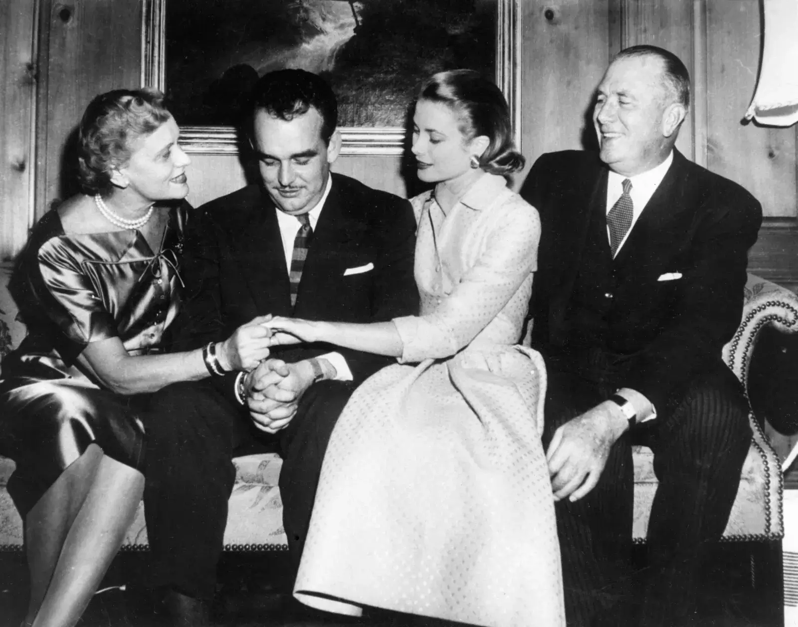 Grace Kelly shows her parents her engagement ring in the house