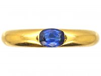 18ct Gold Ellipse Ring set with a Sapphire signed by Cartier