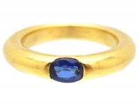 18ct Gold Ellipse Ring set with a Sapphire signed by Cartier