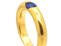 18ct Gold Ellipse Ring set with a Sapphire signed by Cartier