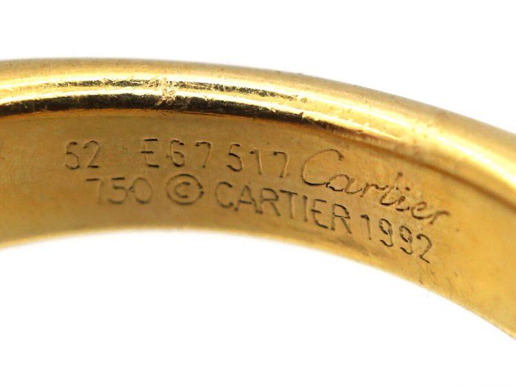 18ct Gold Ellipse Ring set with a Ruby signed by Cartier