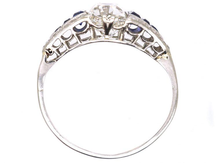 Early 20th Century Platinum Ring set with an Old Cushion Cut Diamond & Sapphires