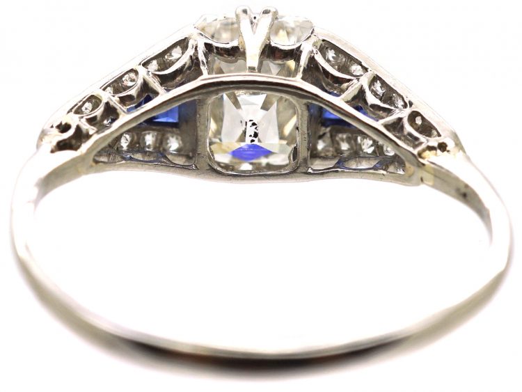 Early 20th Century Platinum Ring set with an Old Cushion Cut Diamond & Sapphires