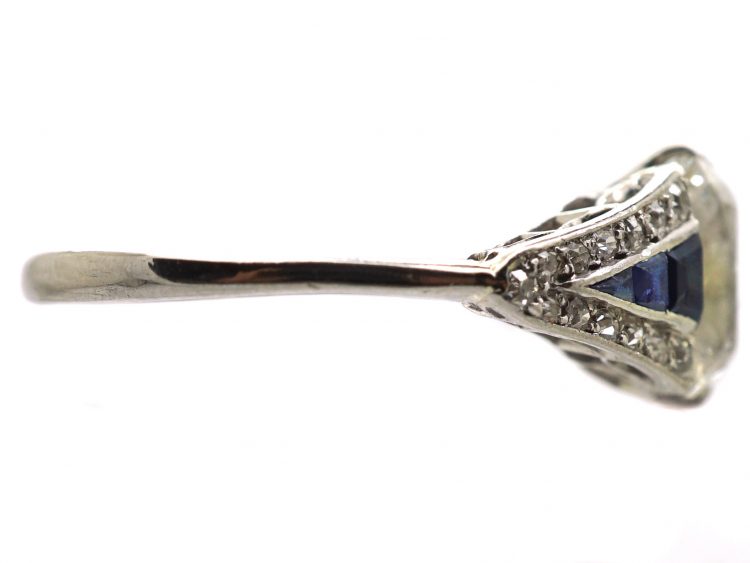 Early 20th Century Platinum Ring set with an Old Cushion Cut Diamond & Sapphires