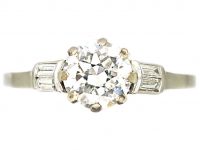 Early 20th Century Platinum, Solitaire Diamond Ring with Baguette Diamond Shoulders