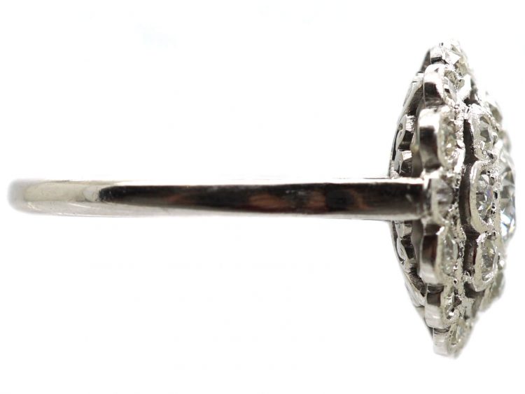 Early 20th Century Platinum, Diamond Daisy Cluster Ring with Outer Ring of Diamonds