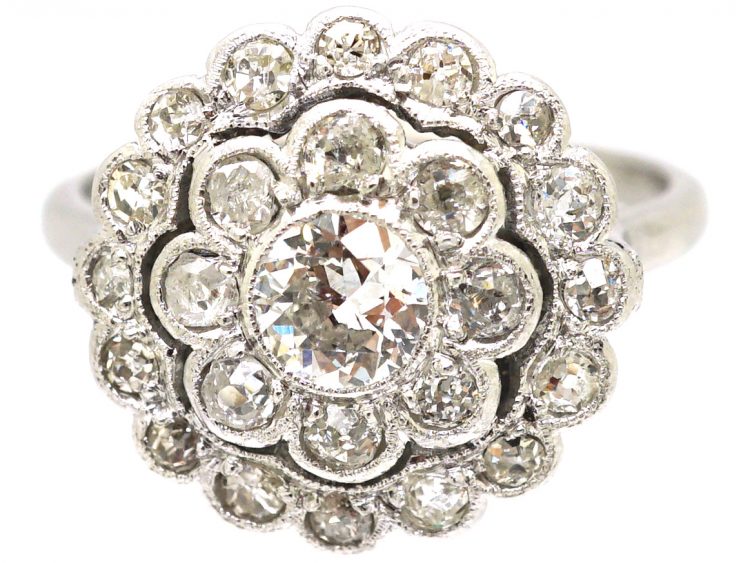 Early 20th Century Platinum, Diamond Daisy Cluster Ring with Outer Ring of Diamonds