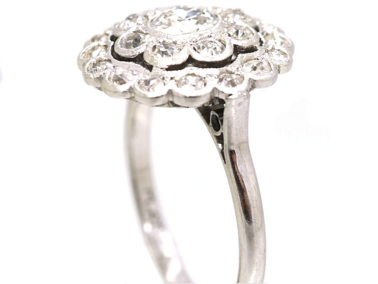 Early 20th Century Platinum, Diamond Daisy Cluster Ring with Outer Ring of Diamonds