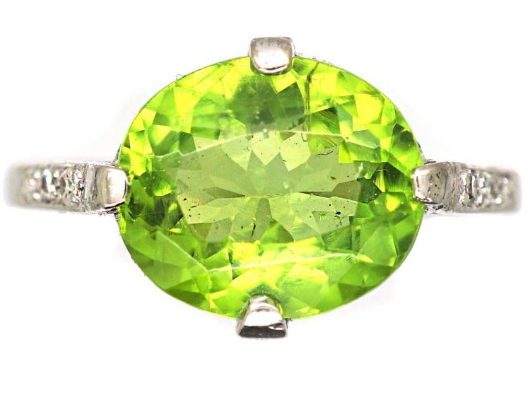 Edwardian Platinum Ring set with a Peridot with Diamond Set Shoulders