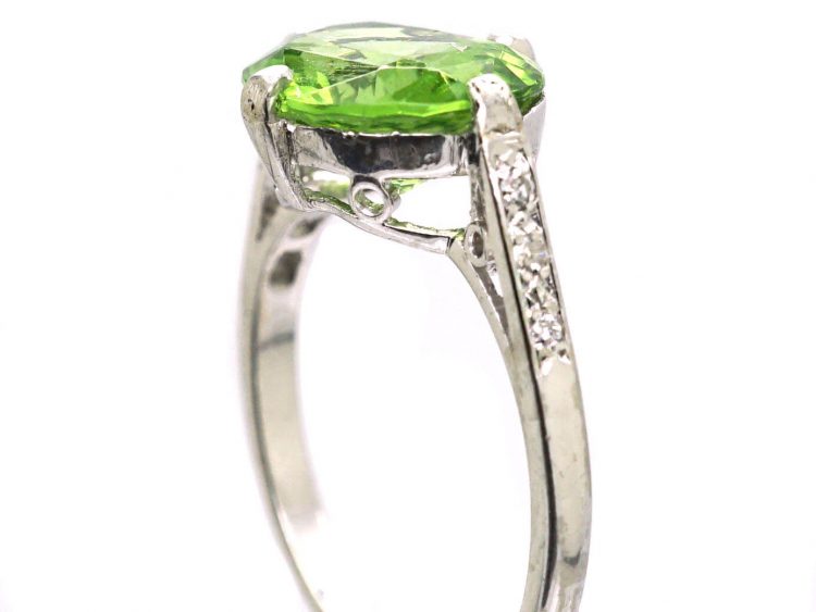 Edwardian Platinum Ring set with a Peridot with Diamond Set Shoulders