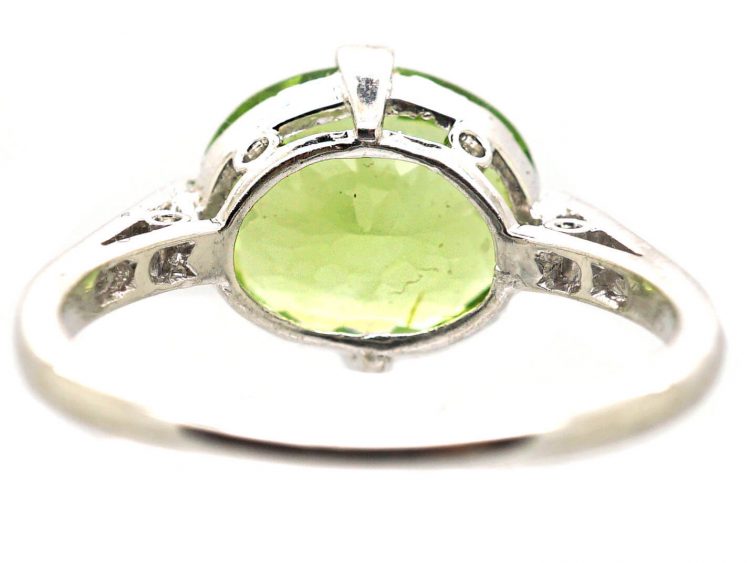 Edwardian Platinum Ring set with a Peridot with Diamond Set Shoulders